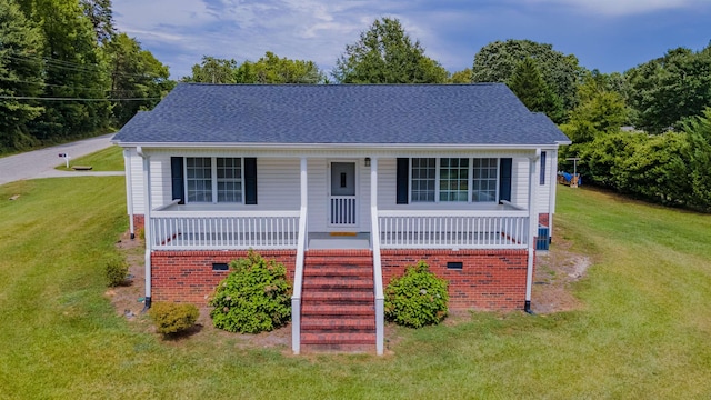 view of front of home with a porch and a front lawn