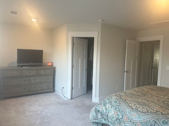 bedroom with light carpet