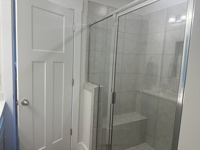 bathroom featuring vanity and walk in shower