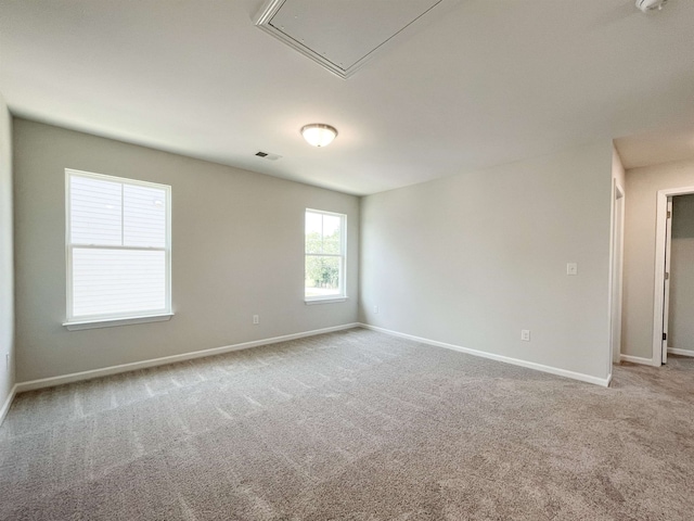 unfurnished room with carpet