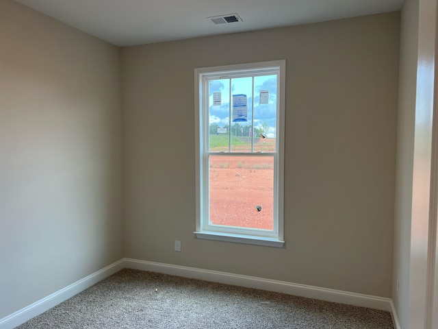 empty room with carpet floors