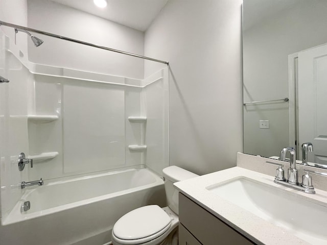 full bathroom featuring bathtub / shower combination, toilet, and vanity with extensive cabinet space