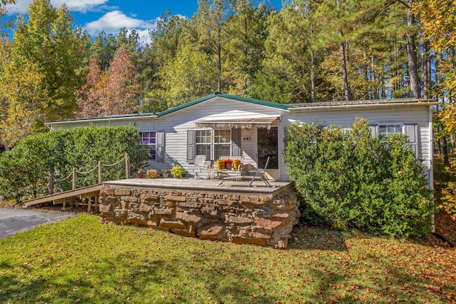 back of property with a patio area