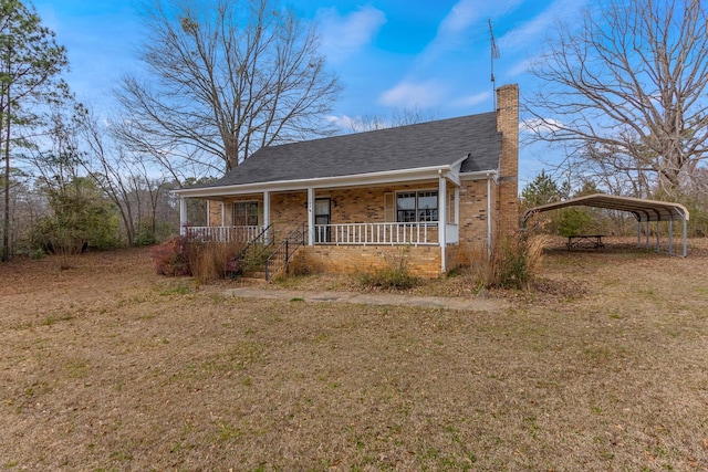 bungalow featuring a porch and a carport