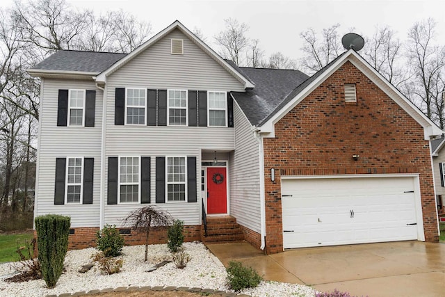 view of front of house with a garage