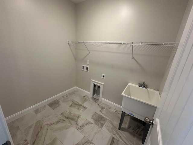 clothes washing area featuring hookup for a washing machine, tile patterned flooring, and hookup for an electric dryer