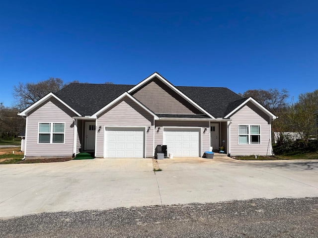 ranch-style house featuring a garage