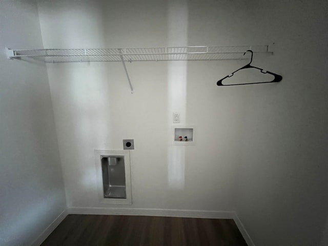 washroom with hookup for a washing machine, dark hardwood / wood-style flooring, and electric dryer hookup