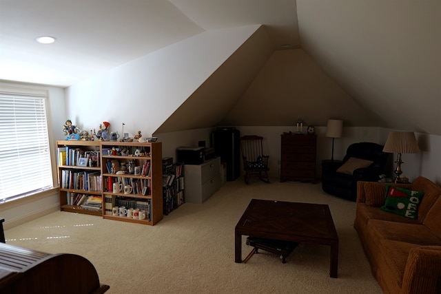 interior space featuring recessed lighting, light carpet, and vaulted ceiling