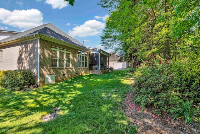 view of yard with a sunroom