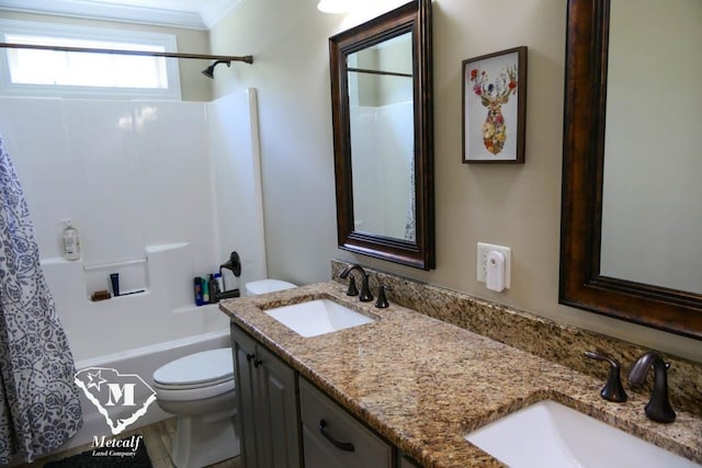 full bathroom featuring ornamental molding, shower / tub combination, toilet, and double sink vanity