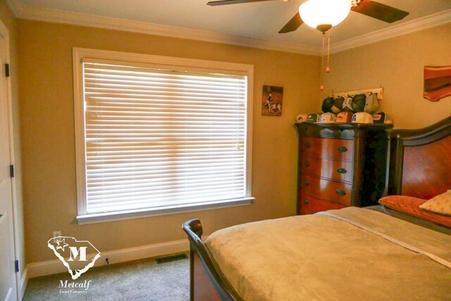 bedroom featuring light colored carpet, multiple windows, crown molding, and ceiling fan