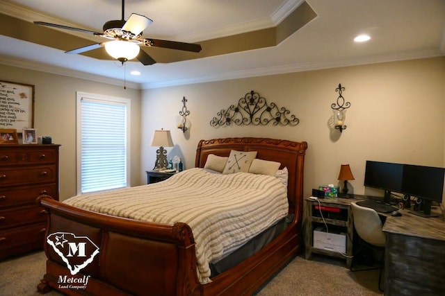 bedroom with crown molding, ceiling fan, dark carpet, and a raised ceiling