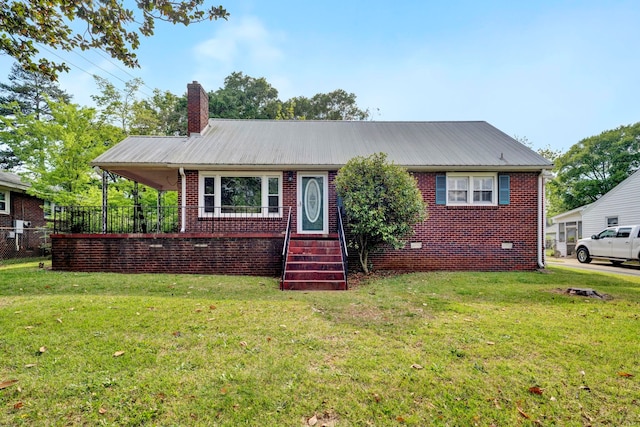 view of front of home featuring a front lawn