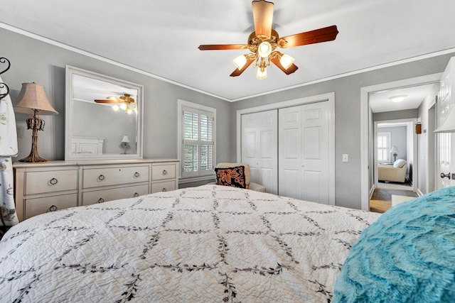 bedroom with a closet, ceiling fan, and crown molding