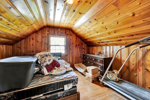 bonus room with wooden ceiling, light hardwood / wood-style flooring, lofted ceiling, and wooden walls