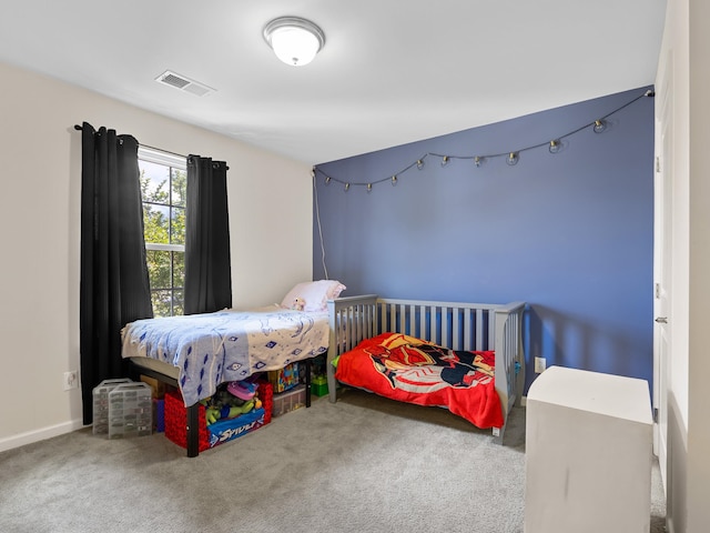 bedroom featuring carpet flooring