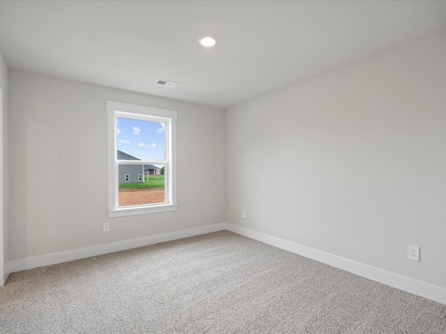 view of carpeted spare room