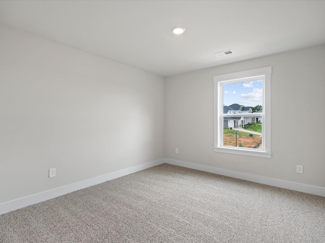 view of carpeted spare room