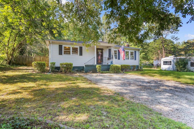 view of front of home with a front yard