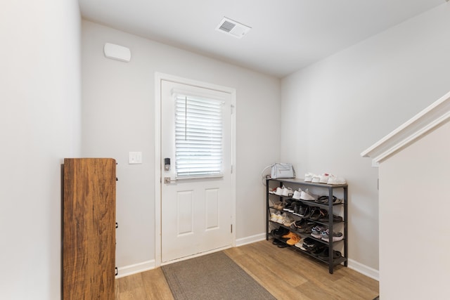 entryway with light wood-type flooring