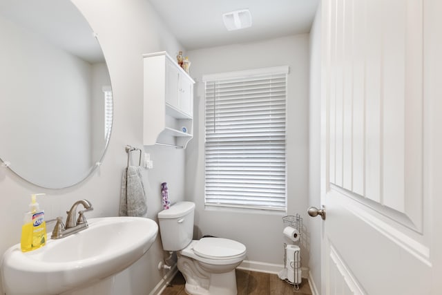 bathroom with sink and toilet