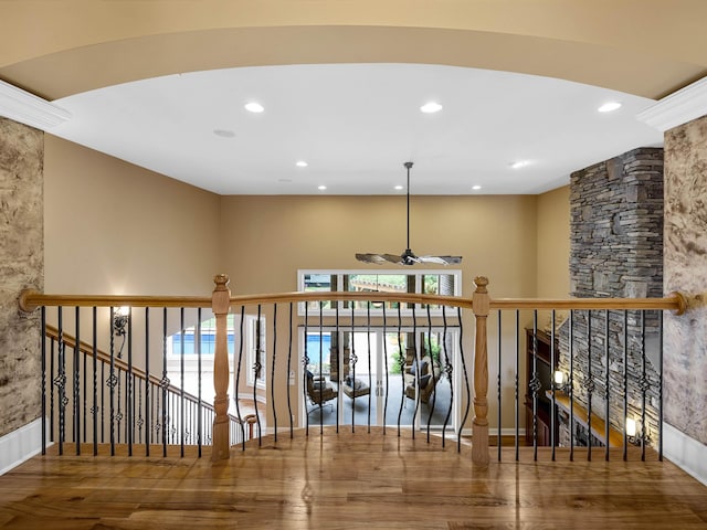 hall with hardwood / wood-style floors