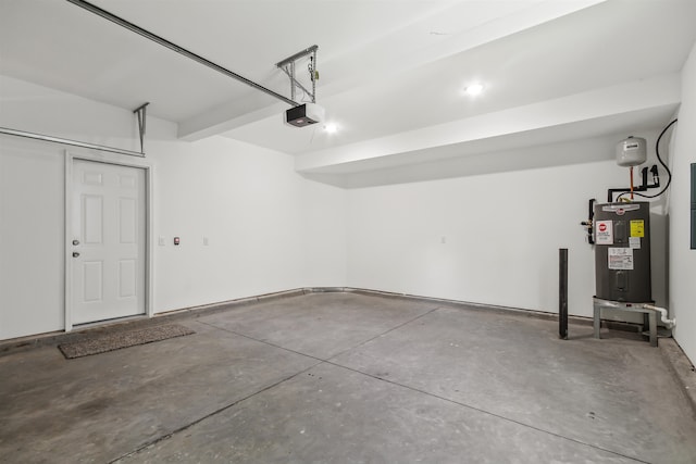 garage featuring a garage door opener and water heater