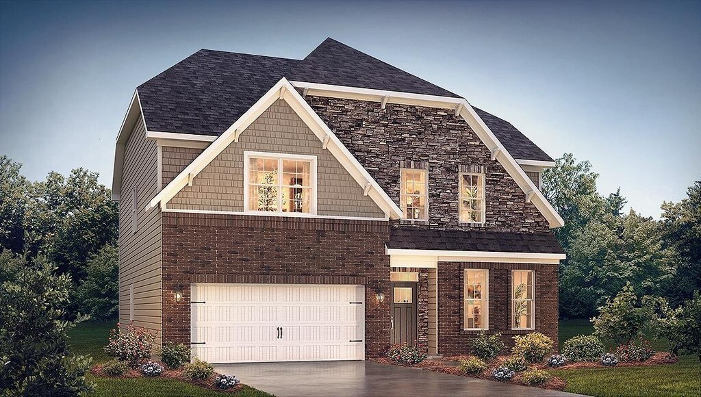 view of front of property featuring a garage