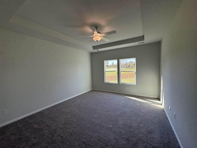 1465 Macedonia, Gaffney, SC 29341 - carpeted spare room featuring a raised ceiling, a ceiling fan, and baseboards
