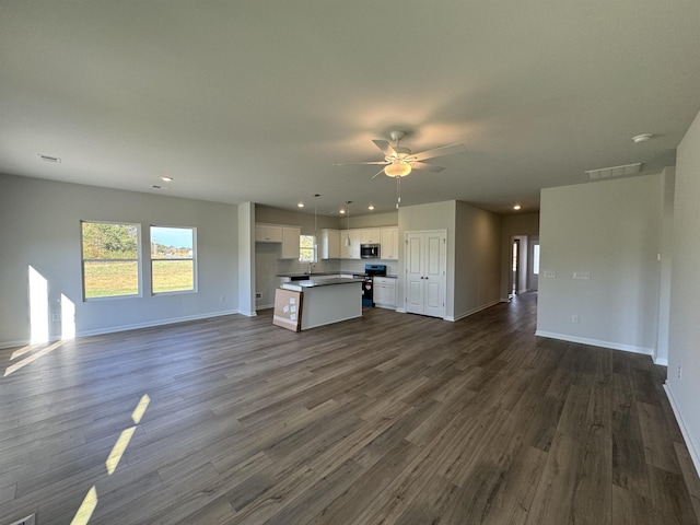 1465 Macedonia, Gaffney, SC 29341 - unfurnished living room with a ceiling fan, baseboards, dark wood finished floors, and recessed lighting