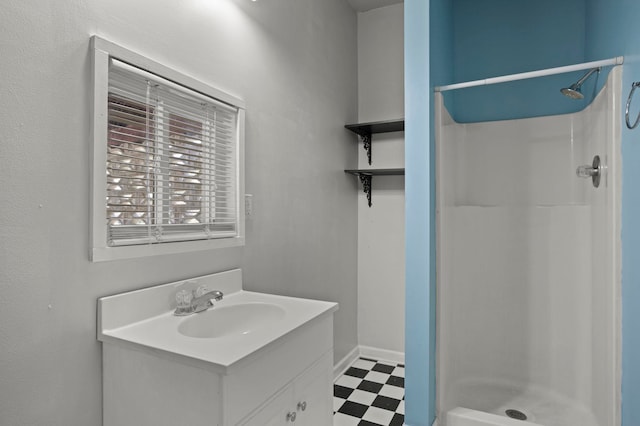 bathroom featuring vanity and walk in shower