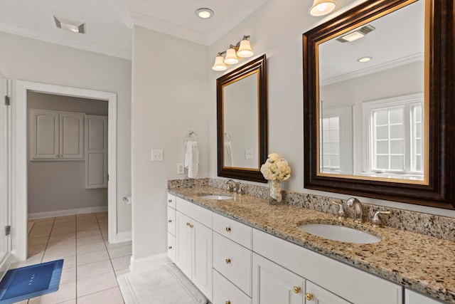 full bathroom with crown molding, visible vents, a sink, and tile patterned floors