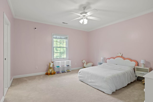 bedroom with baseboards, visible vents, crown molding, and light colored carpet