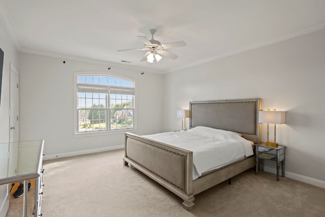 bedroom with carpet, visible vents, crown molding, and baseboards