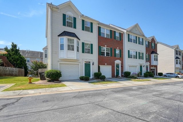 multi unit property featuring a garage