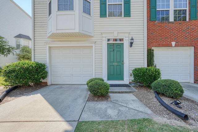 property entrance with a garage