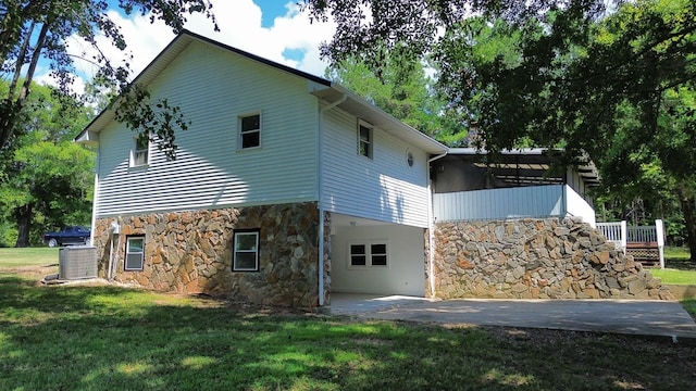 view of property exterior featuring a yard