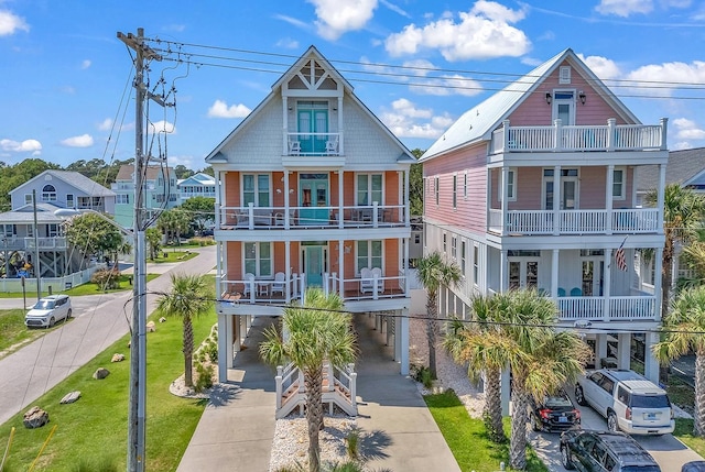 back of property featuring a balcony