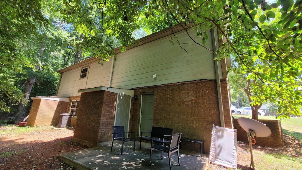 rear view of house with a patio