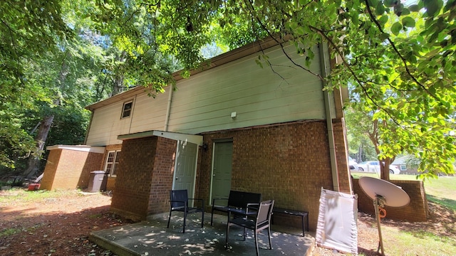 rear view of house with a patio