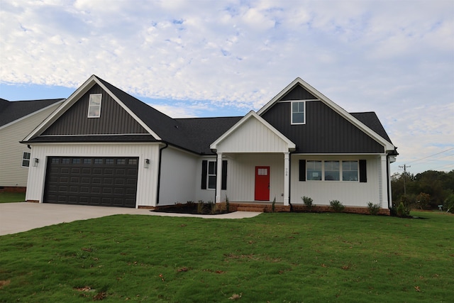 modern farmhouse style home with an attached garage, concrete driveway, and a front lawn