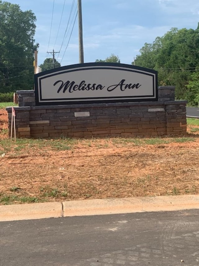 view of community sign