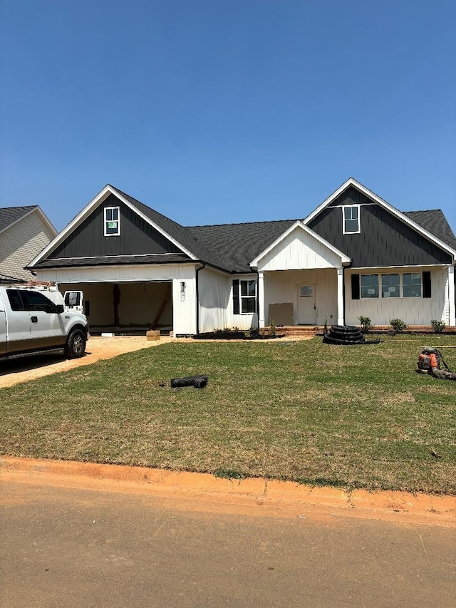 view of front of home with a front yard