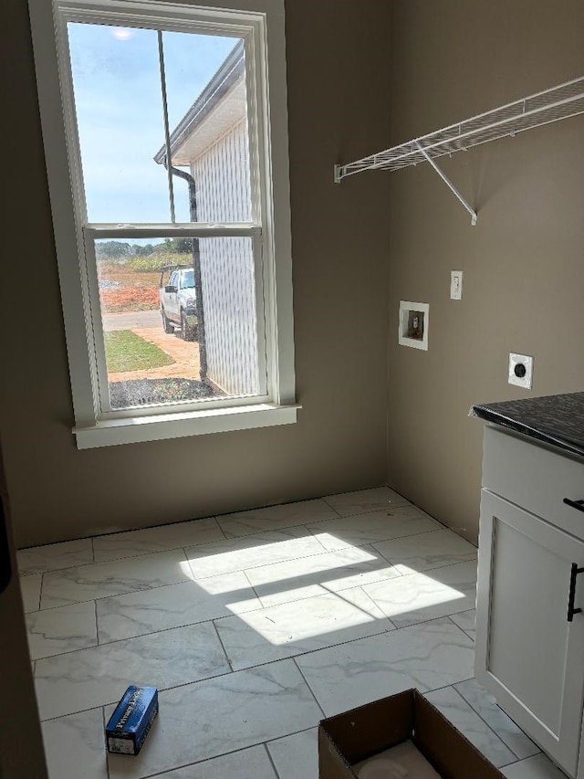 laundry room featuring hookup for an electric dryer and hookup for a washing machine