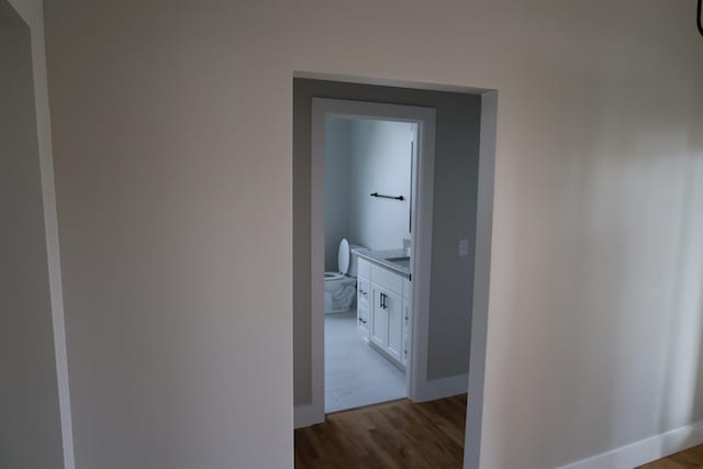 hallway with light wood-type flooring