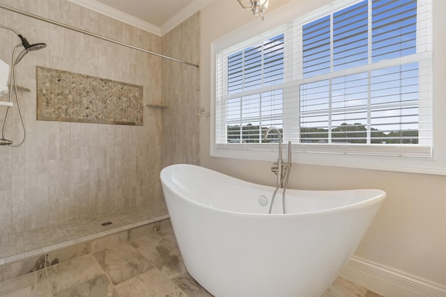 bathroom featuring plus walk in shower, plenty of natural light, and ornamental molding