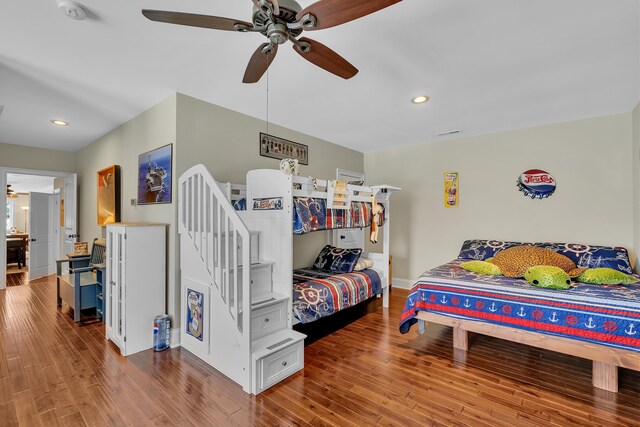 bedroom featuring ceiling fan and wood-type flooring