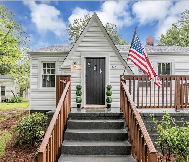 view of front of home with a deck