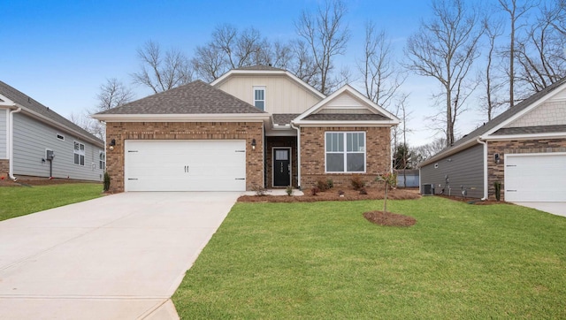 craftsman-style home featuring a garage, central AC, and a front yard